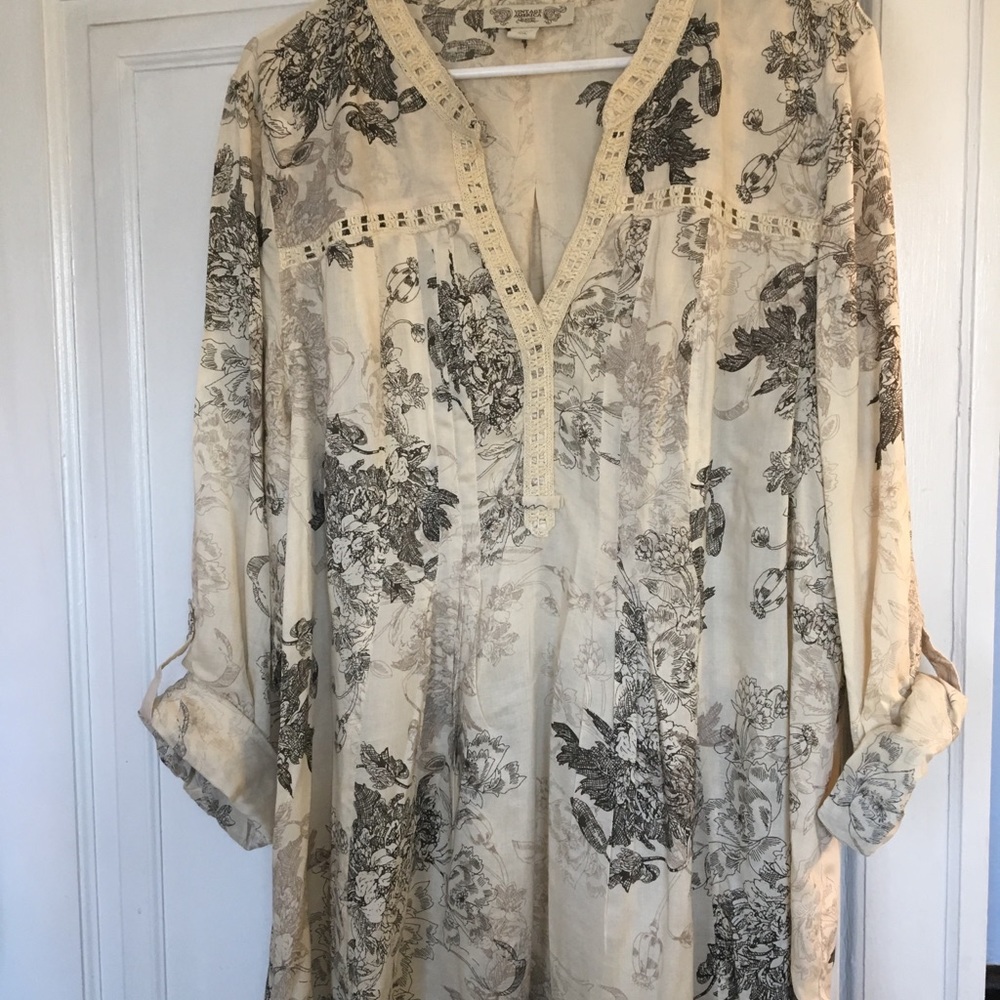XXL silky soft shirt.  Adjustable sleeves.